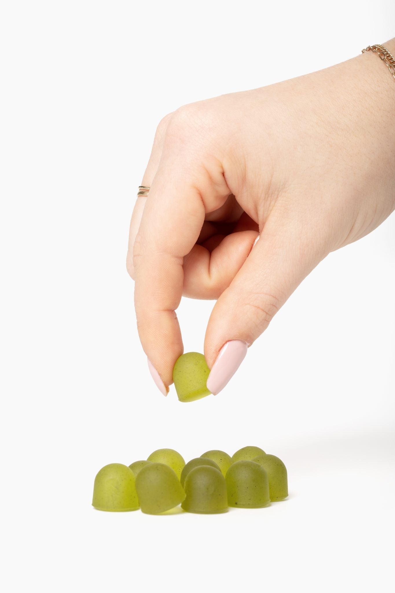 hand grabbing a gummy