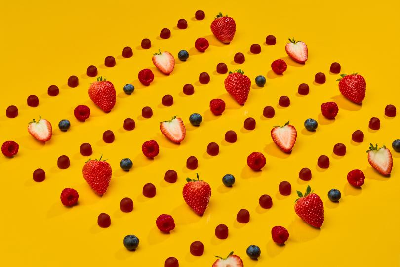 image of WonderBiome Symbiotic Gummies in neat rows with fresh berries
