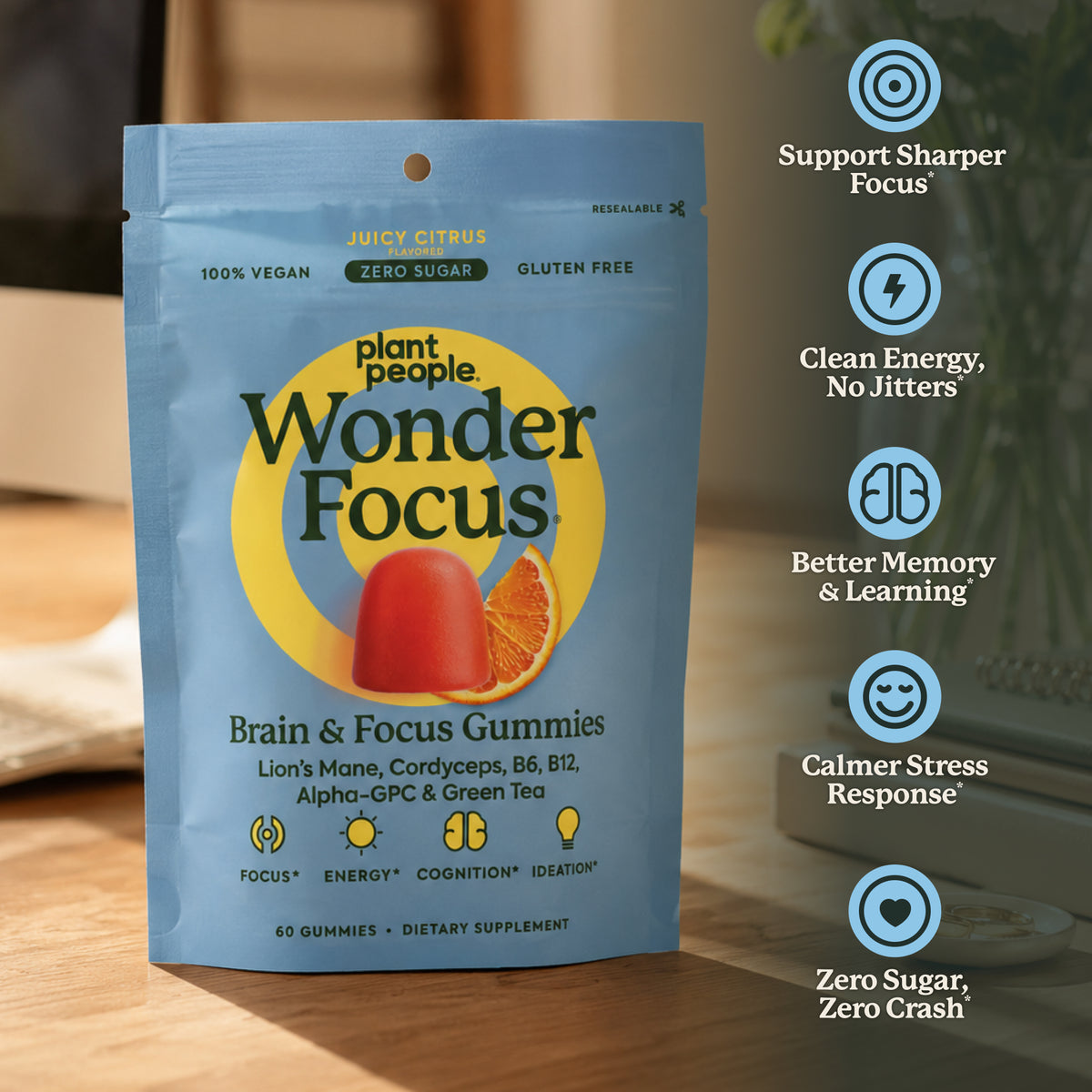 Plant People Wonder Focus Brain & Focus Gummies in a light blue stand-up pouch, shown on a wooden surface with a blurred indoor background and a vertical list of benefits on the right.