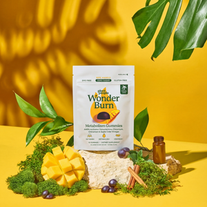 Wonder Burn supplement package on a yellow background with green leaves